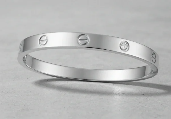 Silver-Tone Screw Head and Crystal Accent Bangle Bracelet